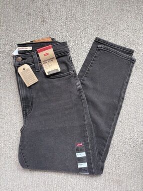 Levi's Black High wasted Mom Jeans with Tan Leather Patch